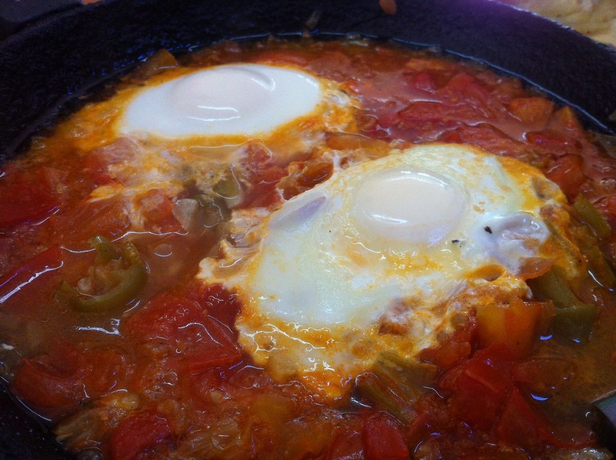 Shakshuka in a cast-iron pan